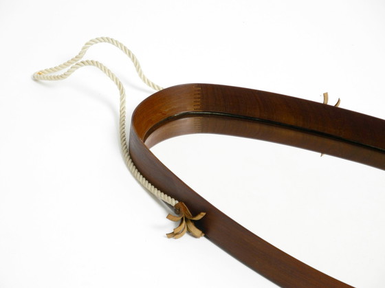 Image 1 of Vintage teakhouten wandspiegel met dik nylon touw