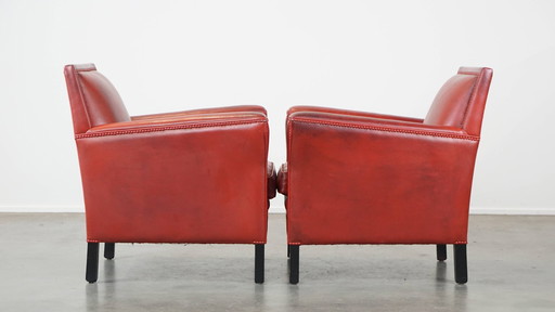 2 X Rood Gekleurde Design Armchairs Gemaakt Van Schapenleer