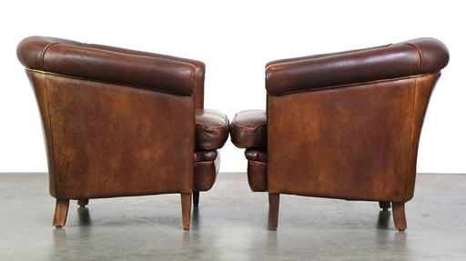 2 x schapenleren clubfauteuil met patina