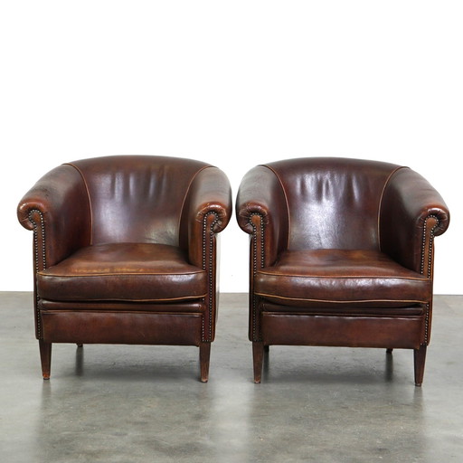 2 x schapenleren clubfauteuil met patina