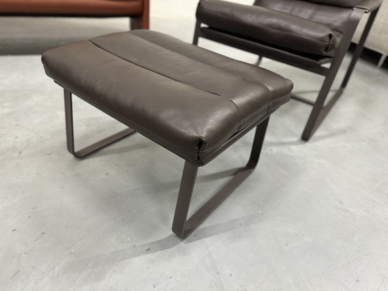 Image 1 of Leolux Indra Fauteuil Met Poef Bruin Arkadia Leer