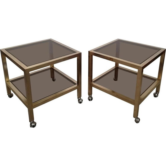 Image 1 of Paar vintage bijzettafeltjes van messing en rookglas met wielen, Italië 1970