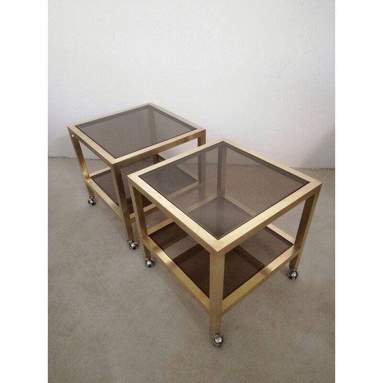 Image 1 of Paar vintage bijzettafeltjes van messing en rookglas met wielen, Italië 1970