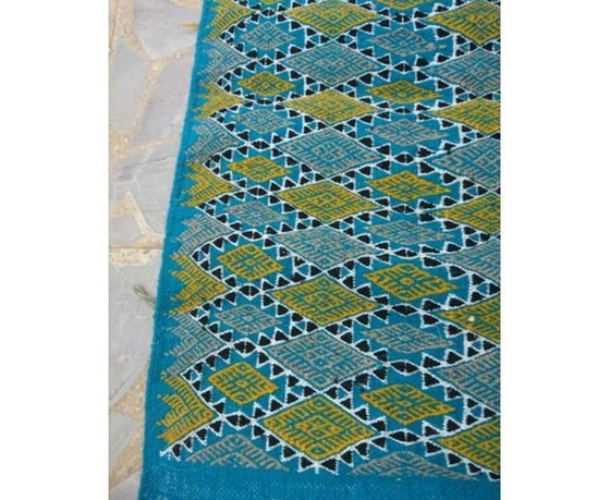 Image 1 of Handgeweven blauw en geel wollen vloerkleed