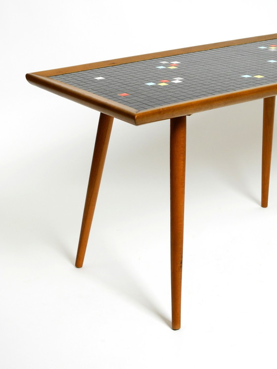 Image 1 of Prachtige lange Mid Century Walnut Houten Salontafel Met Een Mozaïek Oppervlak