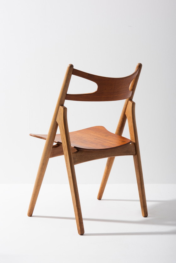 Image 1 of Set Sawbuck Eetkamerstoelen - Hans J. Wegner