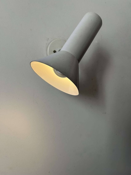 Image 1 of Verstelbare wandlamp van chroom en wit metaal door Raak - Nederland 1970