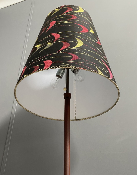 Image 1 of Deense Teakhouten vloerlamp met Zwart en Rood , Geel kap, jaren 60