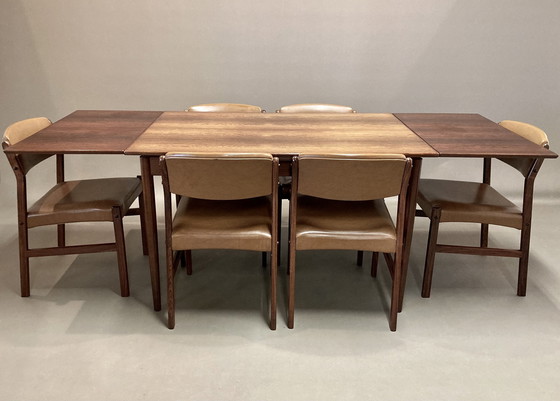 Image 1 of Scandinavisch ontwerp" 1950 Rosewood hoge tafel en 6 stoelen.