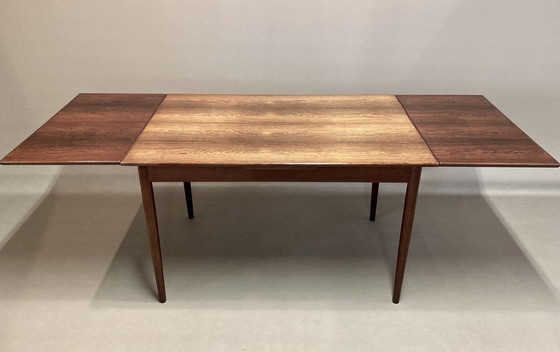 Image 1 of Scandinavisch ontwerp" 1950 Rosewood hoge tafel en 6 stoelen.