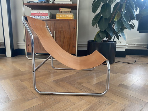 Vintage minimale sling stoel in chroom en zadelleer