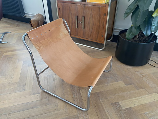 Vintage minimale sling stoel in chroom en zadelleer