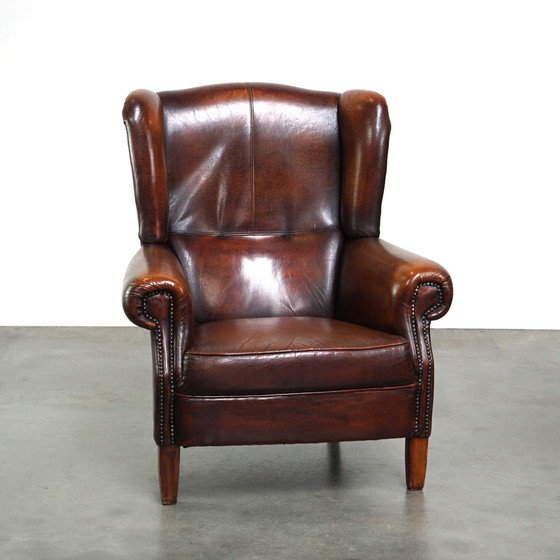 Image 1 of Schapenleren oorfauteuil met vast zitkussen