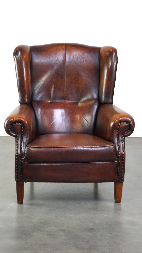 Image 1 of Schapenleren oorfauteuil met vast zitkussen