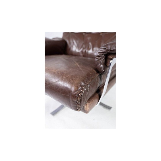 Image 1 of Vintage armstoel bruin leer bekleed met metalen frame van Arne Norell 1970