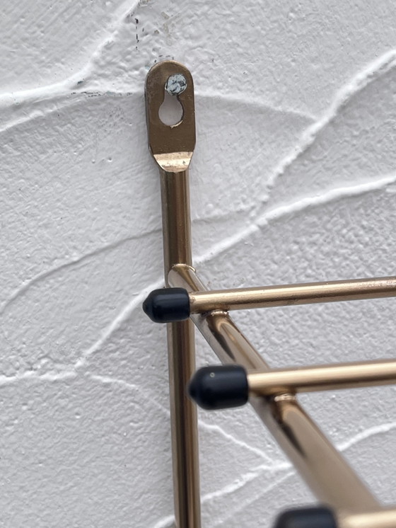 Image 1 of Gouden metalen kleerhanger