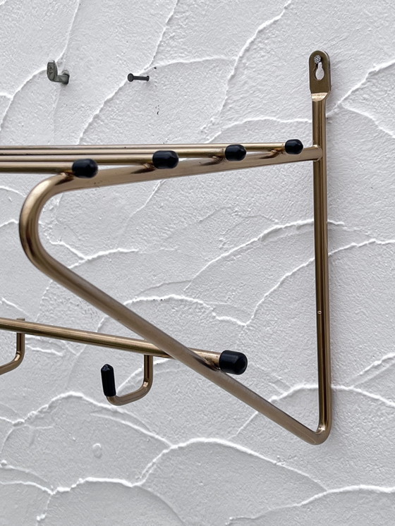 Image 1 of Gouden metalen kleerhanger