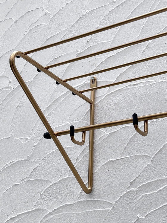 Image 1 of Gouden metalen kleerhanger