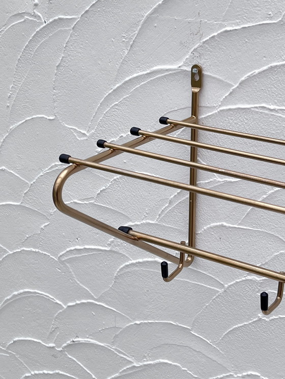 Image 1 of Gouden metalen kleerhanger
