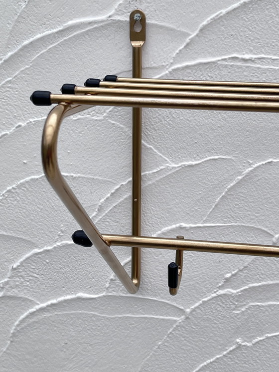 Image 1 of Gouden metalen kleerhanger