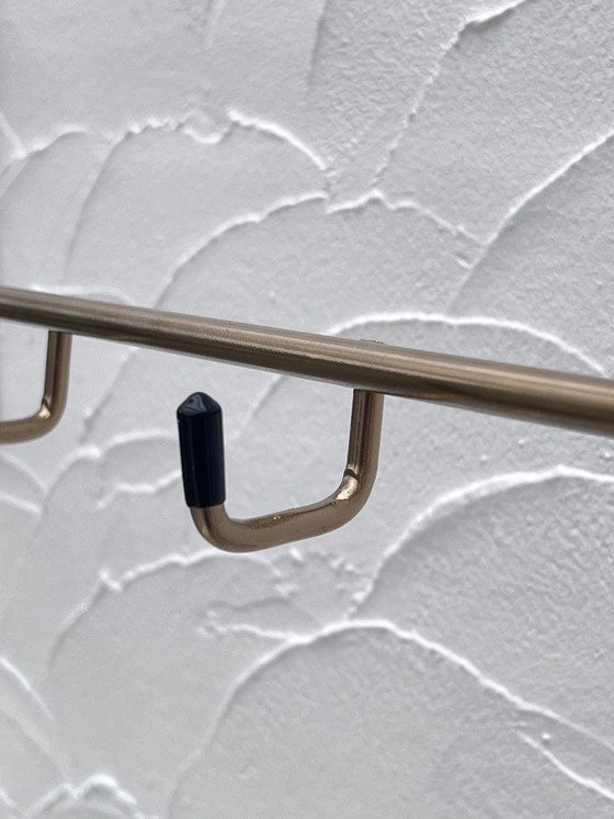 Image 1 of Gouden metalen kleerhanger