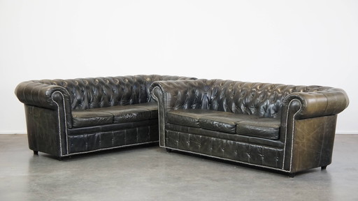 2 X Zwarte Rundleren Chesterfield Bank