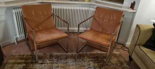 2x Arco Spine fauteuils