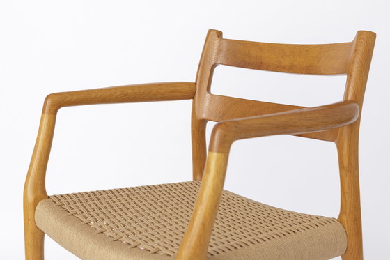 Image 1 of 1 van 2 Niels Moller fauteuil, model 67, eikenhout, jaren 70 Vintage