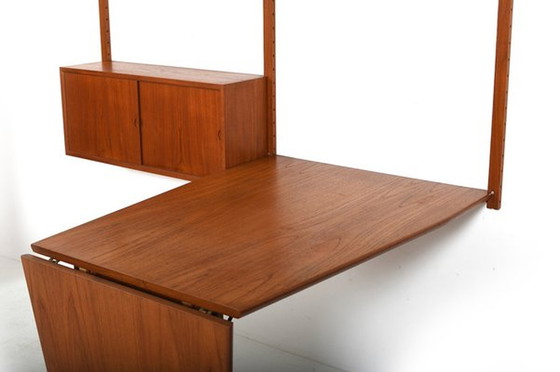 Image 1 of Koninklijk systeem met kegelvormig bureau in teak van Poul Cadovius, 1960