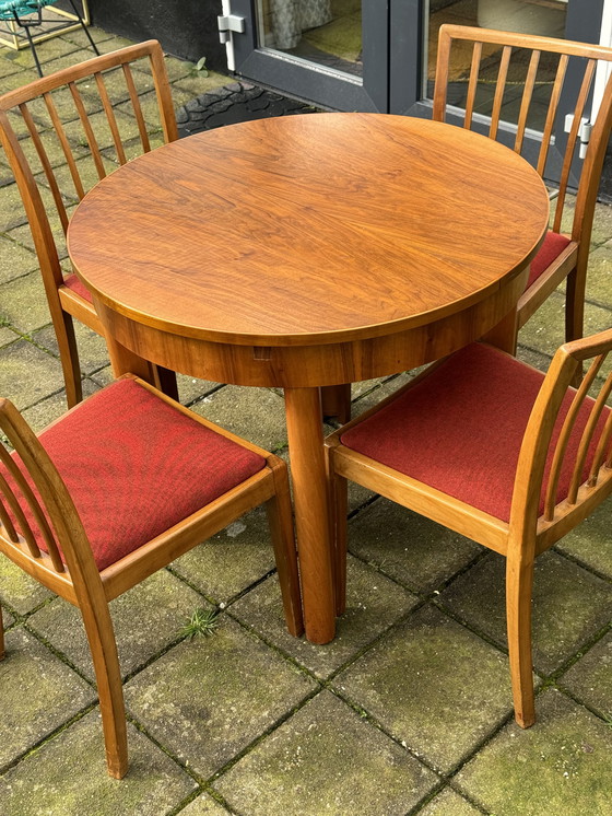 Image 1 of Vintage gemengd houten ronde tafel en 4x stoelen