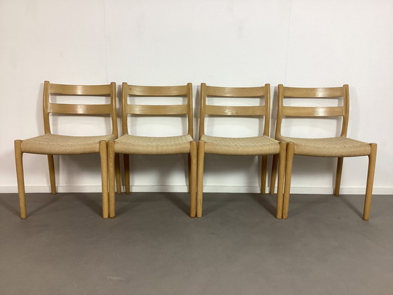 Image 1 of 4 Vintage Niels Otto Moller Deense Stoelen Gezeept Eiken 