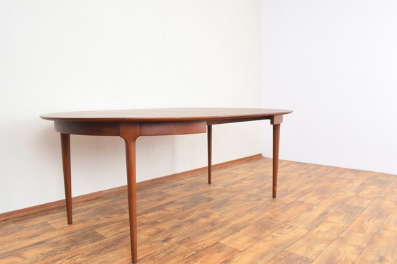 Image 1 of Mid Century Deense teakhouten eettafel, 1960.