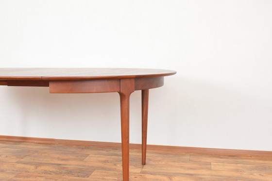 Image 1 of Mid Century Deense teakhouten eettafel, 1960.