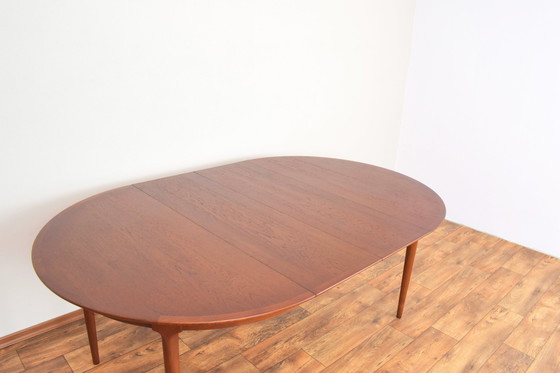 Image 1 of Mid Century Deense teakhouten eettafel, 1960.