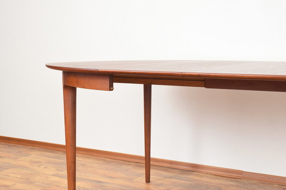 Image 1 of Mid Century Deense teakhouten eettafel, 1960.