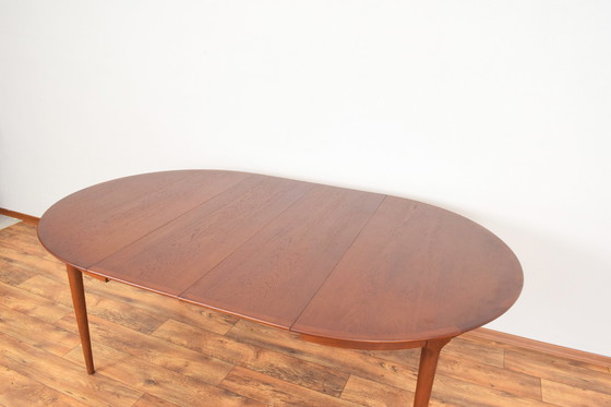 Image 1 of Mid Century Deense teakhouten eettafel, 1960.