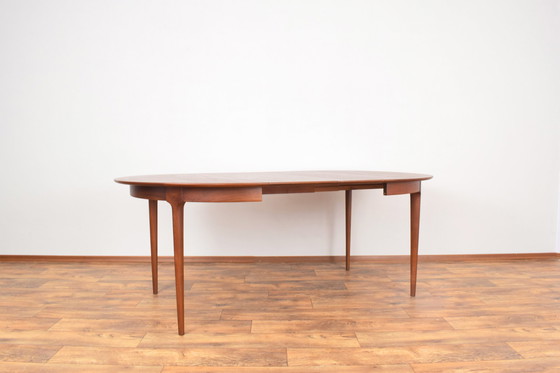 Image 1 of Mid Century Deense teakhouten eettafel, 1960.