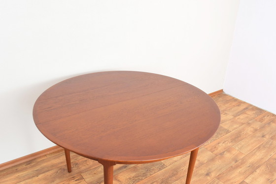 Image 1 of Mid Century Deense teakhouten eettafel, 1960.