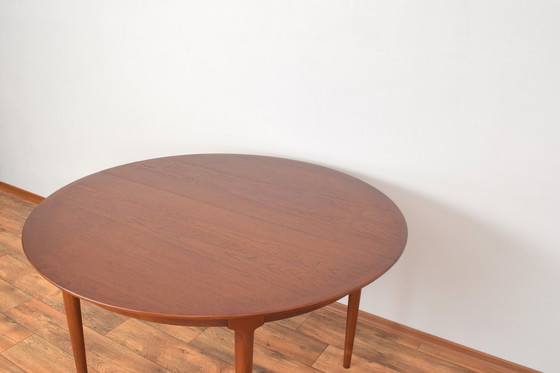 Image 1 of Mid Century Deense teakhouten eettafel, 1960.