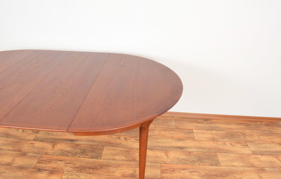 Image 1 of Mid Century Deense teakhouten eettafel, 1960.