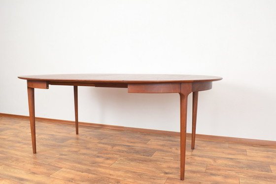 Image 1 of Mid Century Deense teakhouten eettafel, 1960.