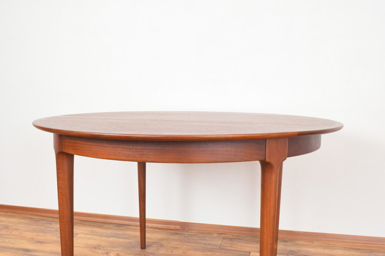 Image 1 of Mid Century Deense teakhouten eettafel, 1960.