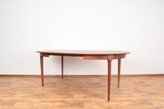 Image 1 of Mid Century Deense teakhouten eettafel, 1960.