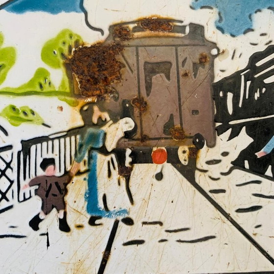 Image 1 of Vintage emaille bord "Steek een trein niet over kan een andere trein verbergen", 1930