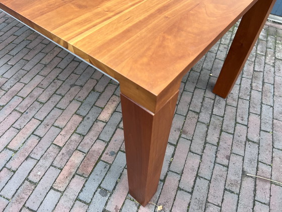 Image 1 of Leolux Vivre Eetkamertafel kersen hout 