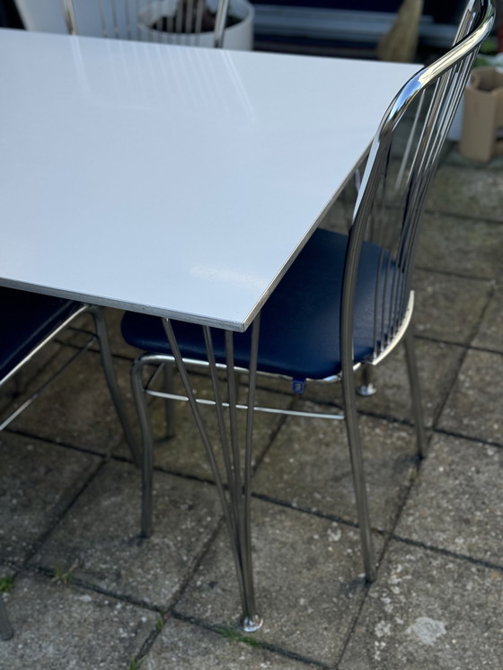 Image 1 of Fritz Hansen Tafel en 4x Nowy Styl Eetkamerstoelen