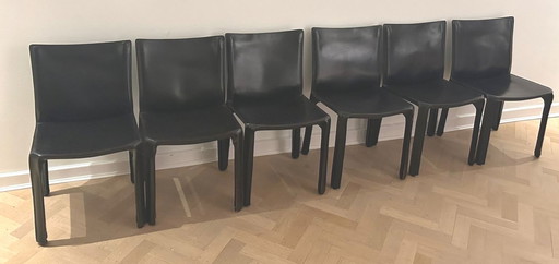 6x Cassina cab stoelen + 2 kuipzetels Idem Alles Zwart