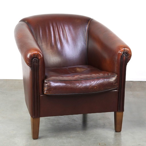 Clubfauteuil van schapenleer met patina