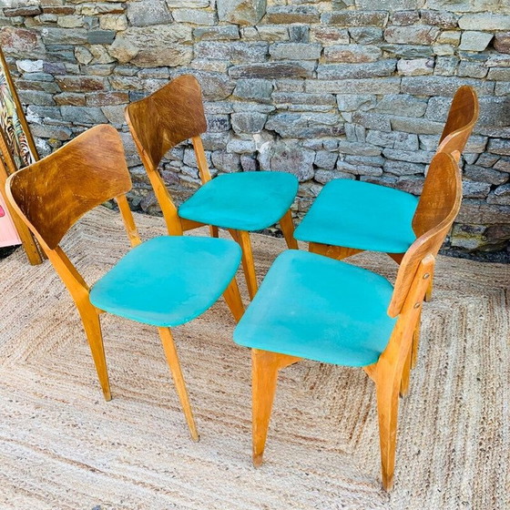 Image 1 of Set van 4 vintage vinyl houten stoelen