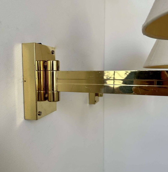 Image 1 of 2X verstelbare wandlampen in massief messing - Zweden 1970